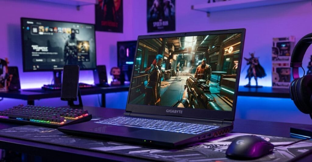 Notebook Gigabyte G5 ME em setup gamer com luzes ambiente e periféricos ao redor