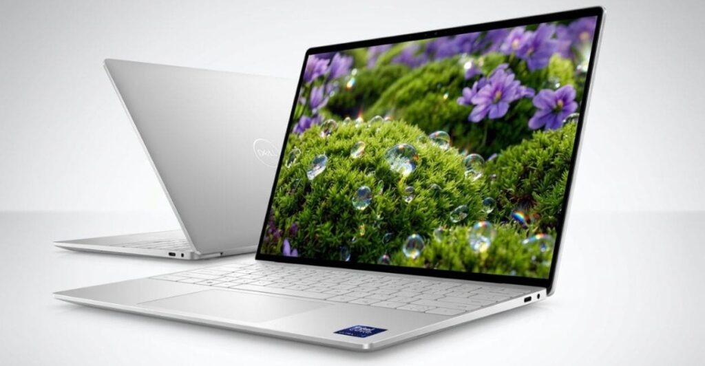 Dois Dell XPS 13 mostrando acabamento em alumínio e tela aberta