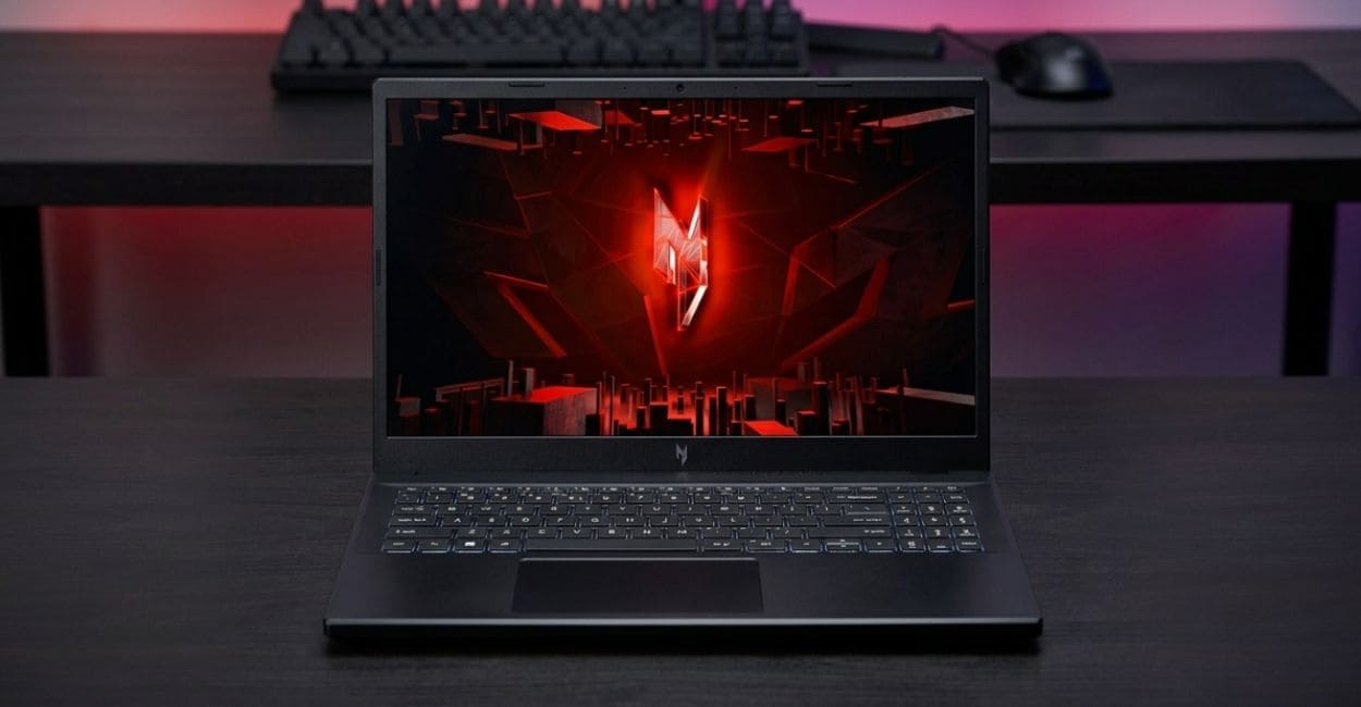 Notebook gamer Acer Nitro V15 ANV15-52-514Z aberto em setup gamer com iluminação neon